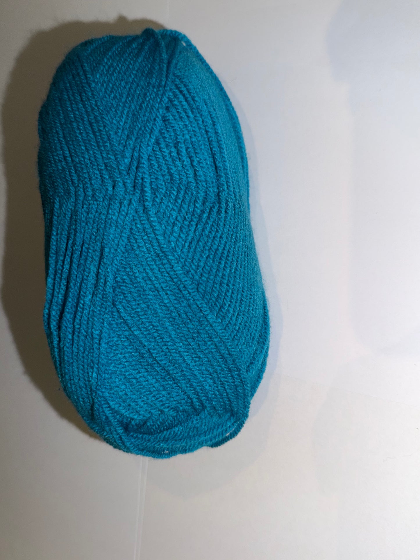Custom Reversible Beanies in various handmade wooly color combinations.