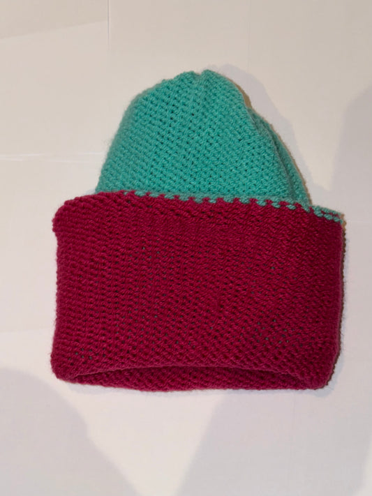 Handmade Reversible Wooly Beanie Aqua and Magenta showing the two-tone artisanal knit design.