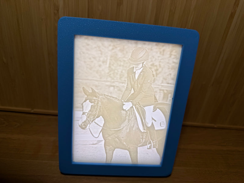 Lithophane lit — photo revealed in warm light